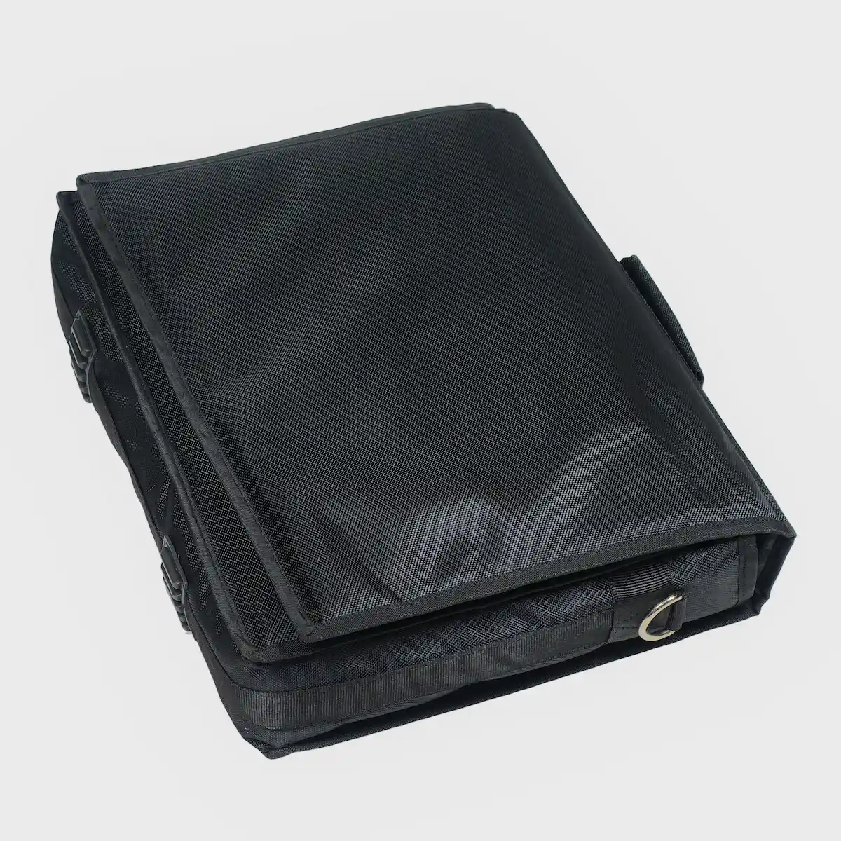 Black heavy-duty padded gig bag for a wooden surpeti drone instrument