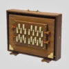 Front view of a National Music teak wood Shruti Box showing 2-octave white keys from C2 to B3